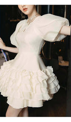 FLARED BUBBLE MINI DRESS IN WHITE