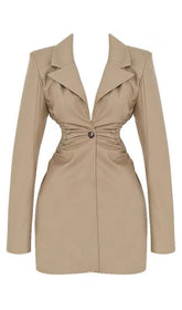 Low-cut dress with lapel collar.