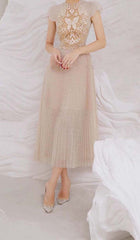 PLEATED EMBROIDERY MIDI DRESS IN BEIGE