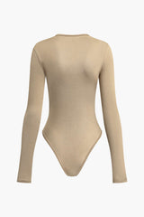 Asymmetrical Cut Out Long Sleeve Bodysuit