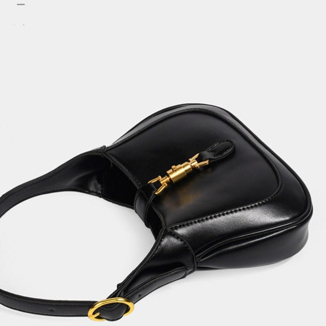 Black Classic Curved Leather Handbag with Signature Buckle Closure