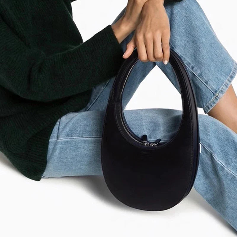 Black Shoulder Bag With Sleek Silver Accents