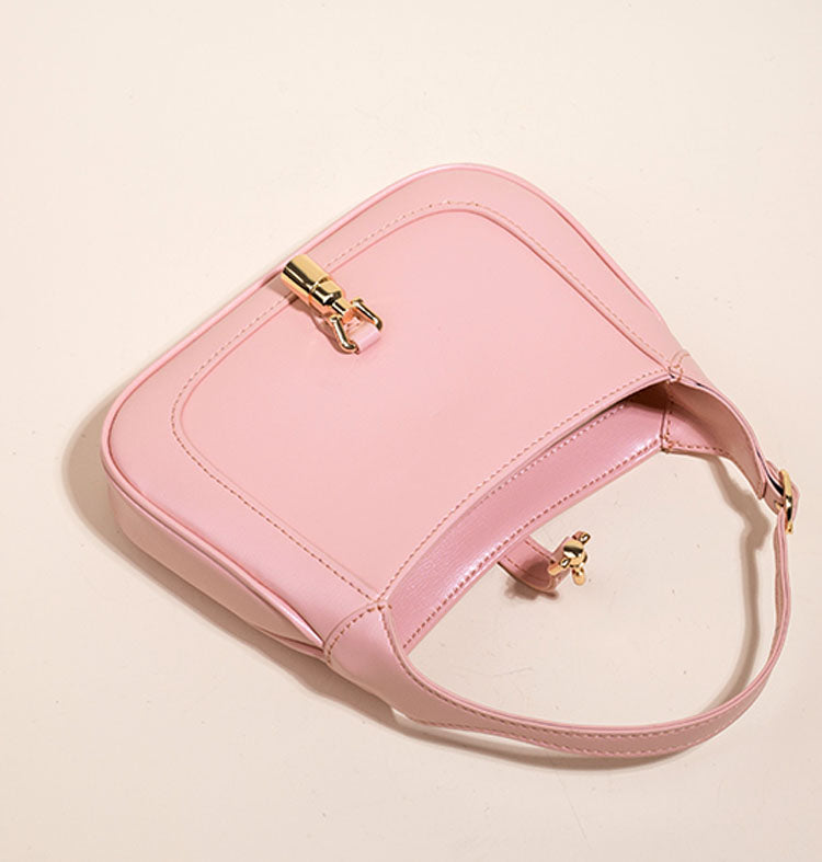 Pink Classic Curved Leather Handbag with Signature Buckle Closure