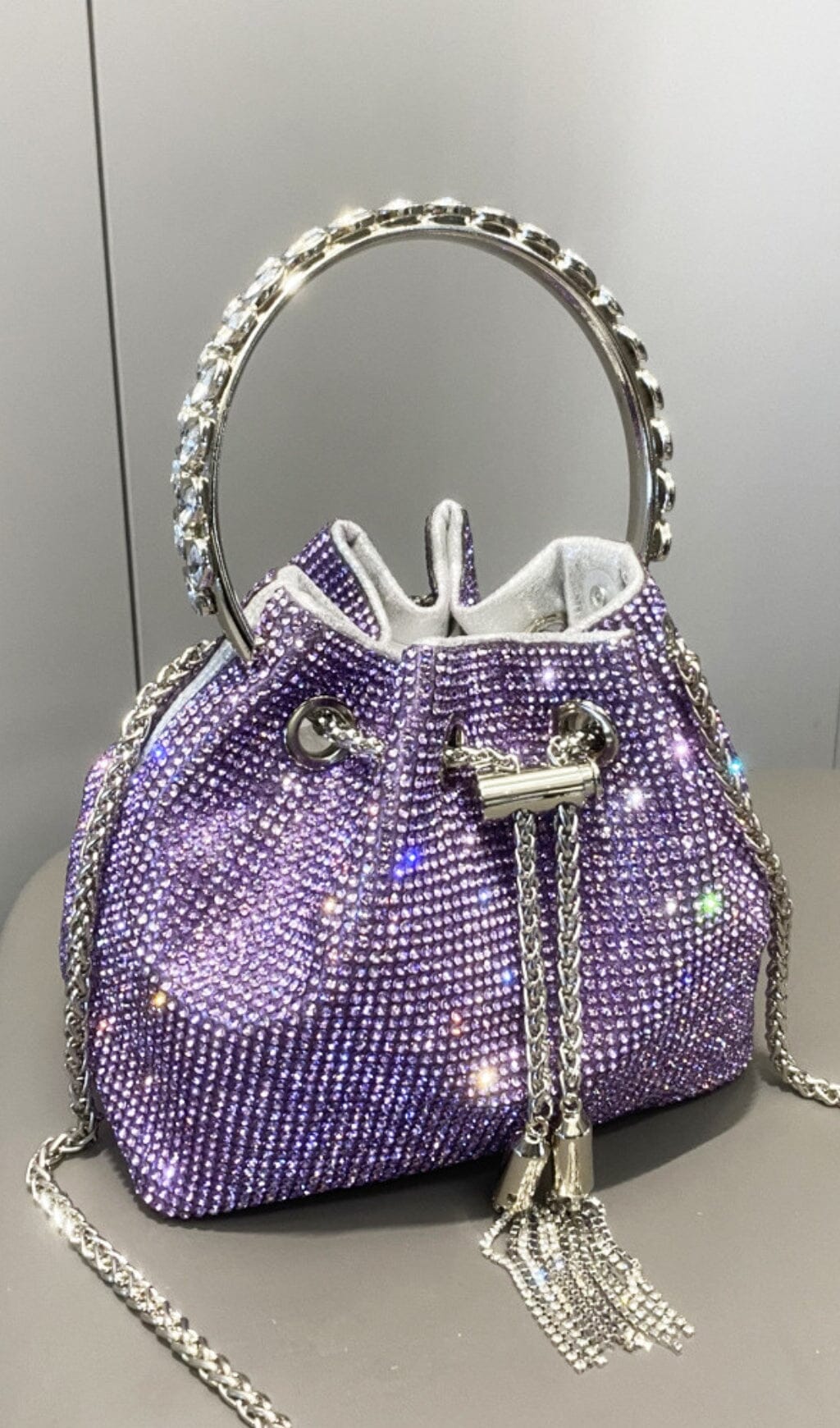 CRYSTAL EMBELLISHED BUCKET BAG IN PURPLE