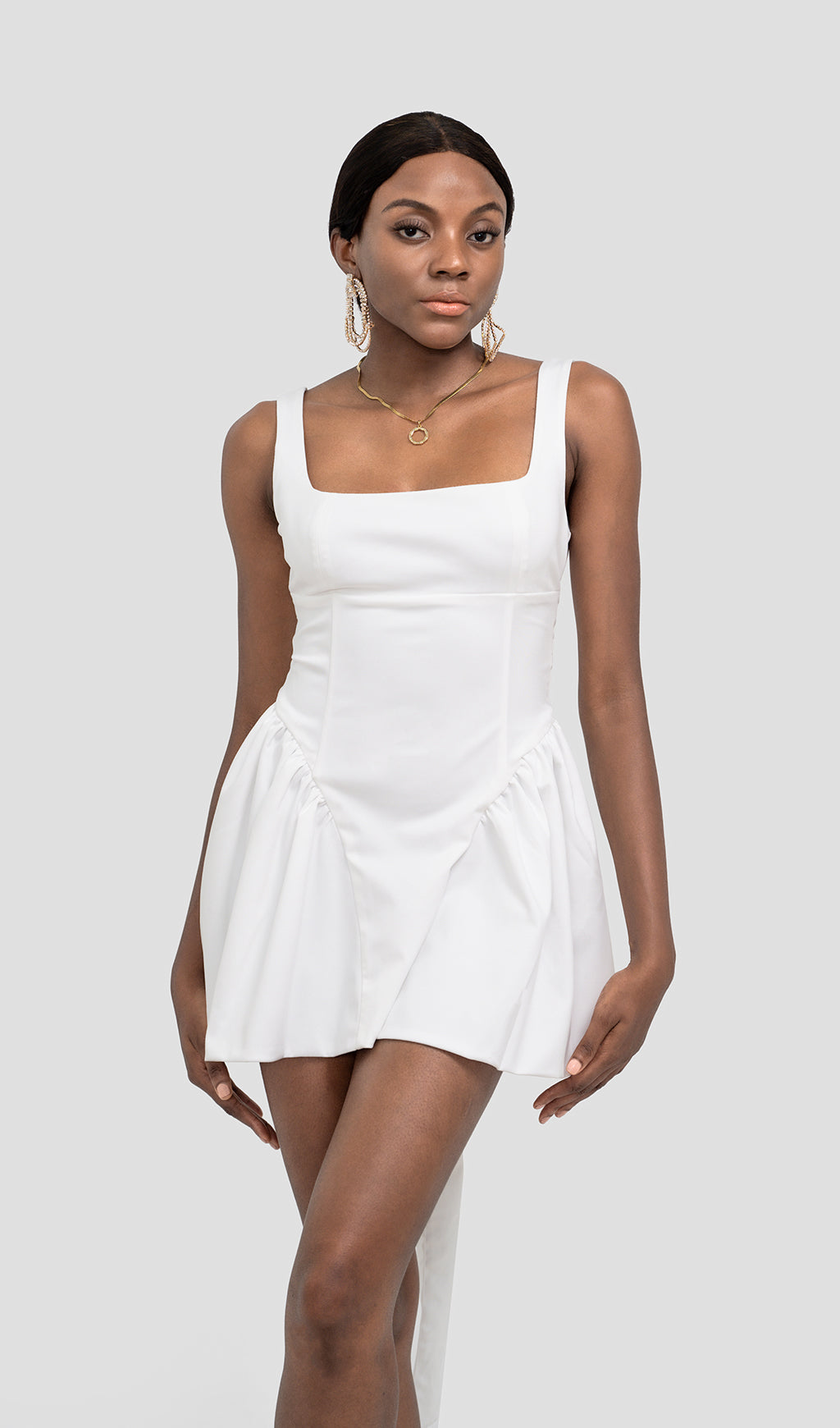 BACKLESS BOW MINI DRESS IN IVORY