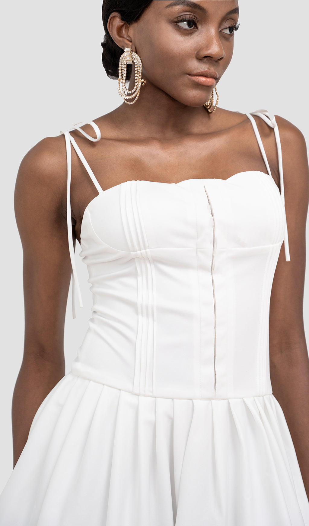 PLEATED MINI DRESS IN WHITE