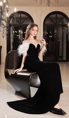 ELEGANT FEATHER OFF SHOULDER FISHTAIL MAXI DRESS IN BLACK