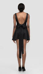 BACKLESS BOW MINI DRESS IN BLACK