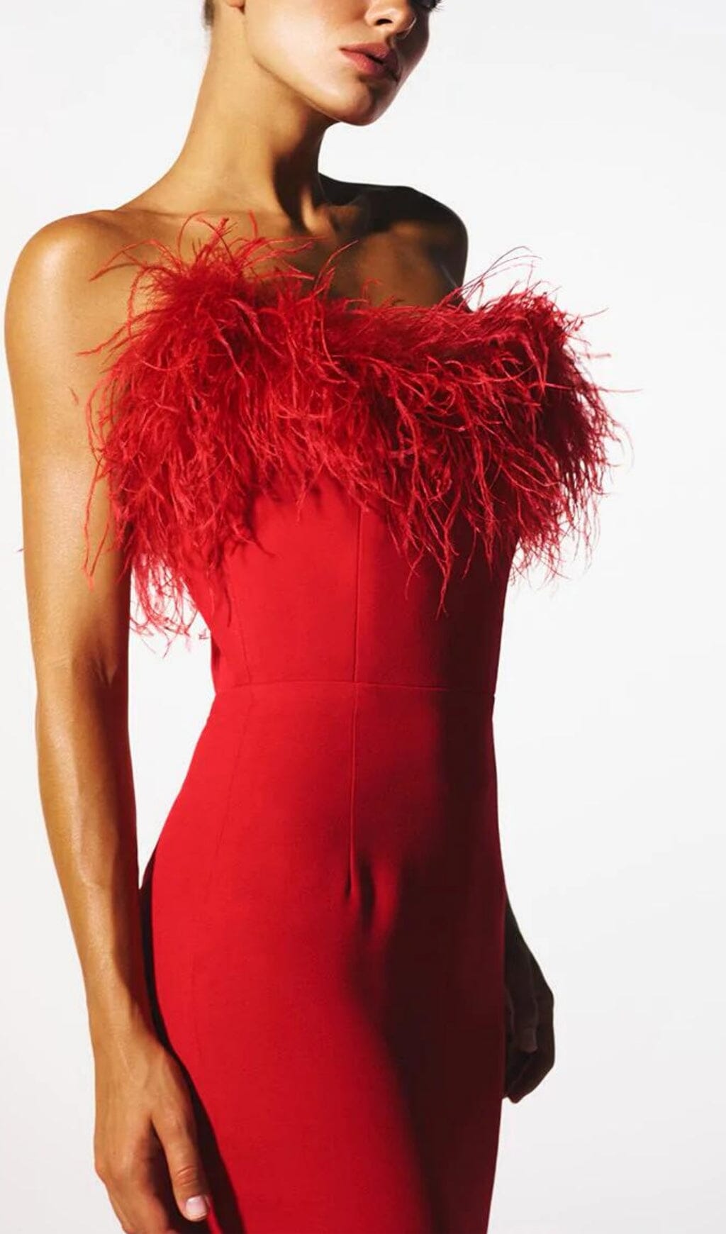 STRETCH STRAPLESS FEATHER TRIMMED GOWN IN RED