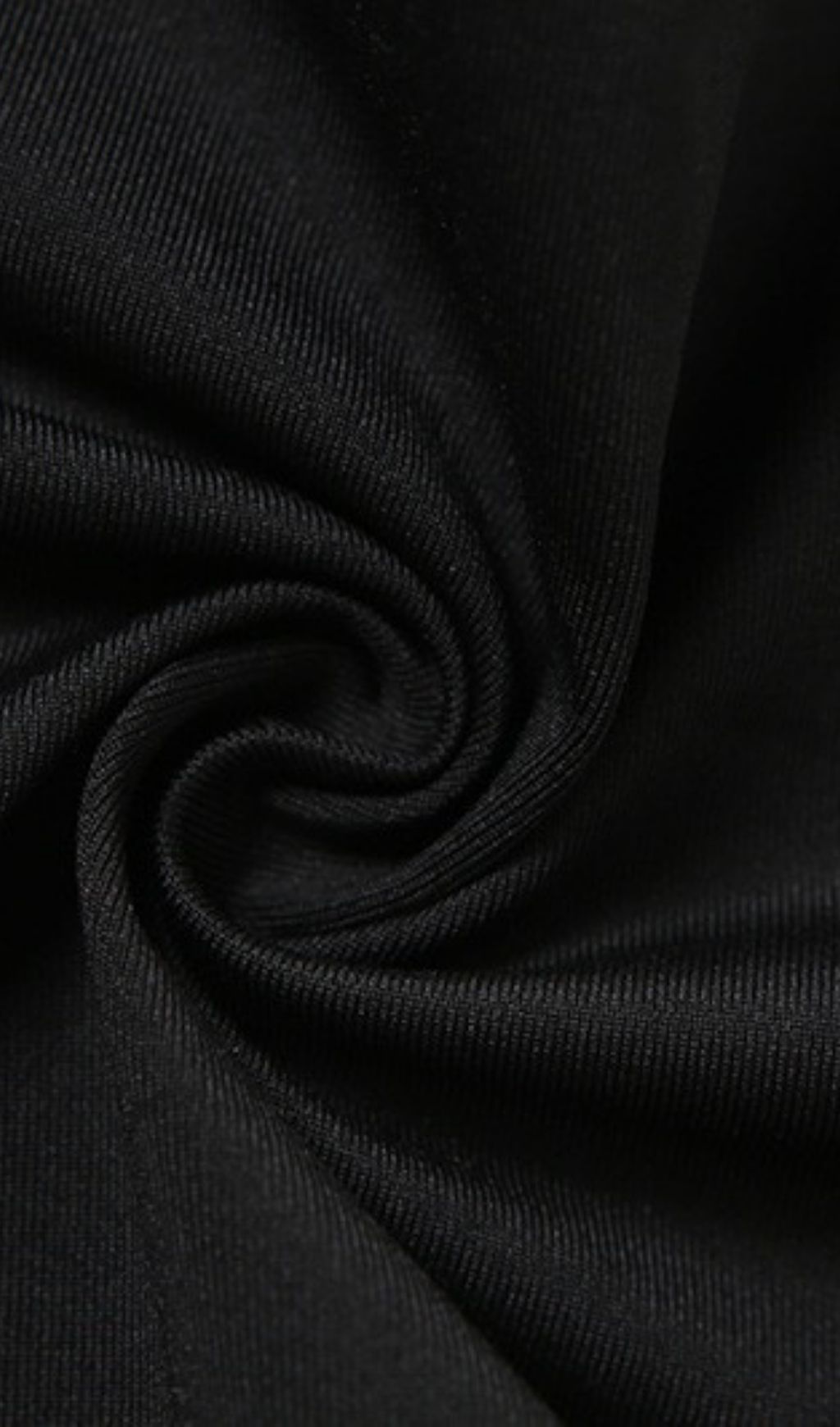 A SMALL VEST WITH A HALTER HOOK IN BLACK